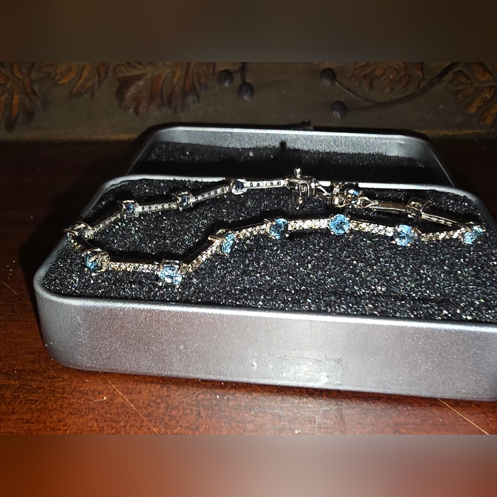 7.5" Tennis Brac BlTopaz W/ White Sapphire Accents Set In Sterling .925 Silver